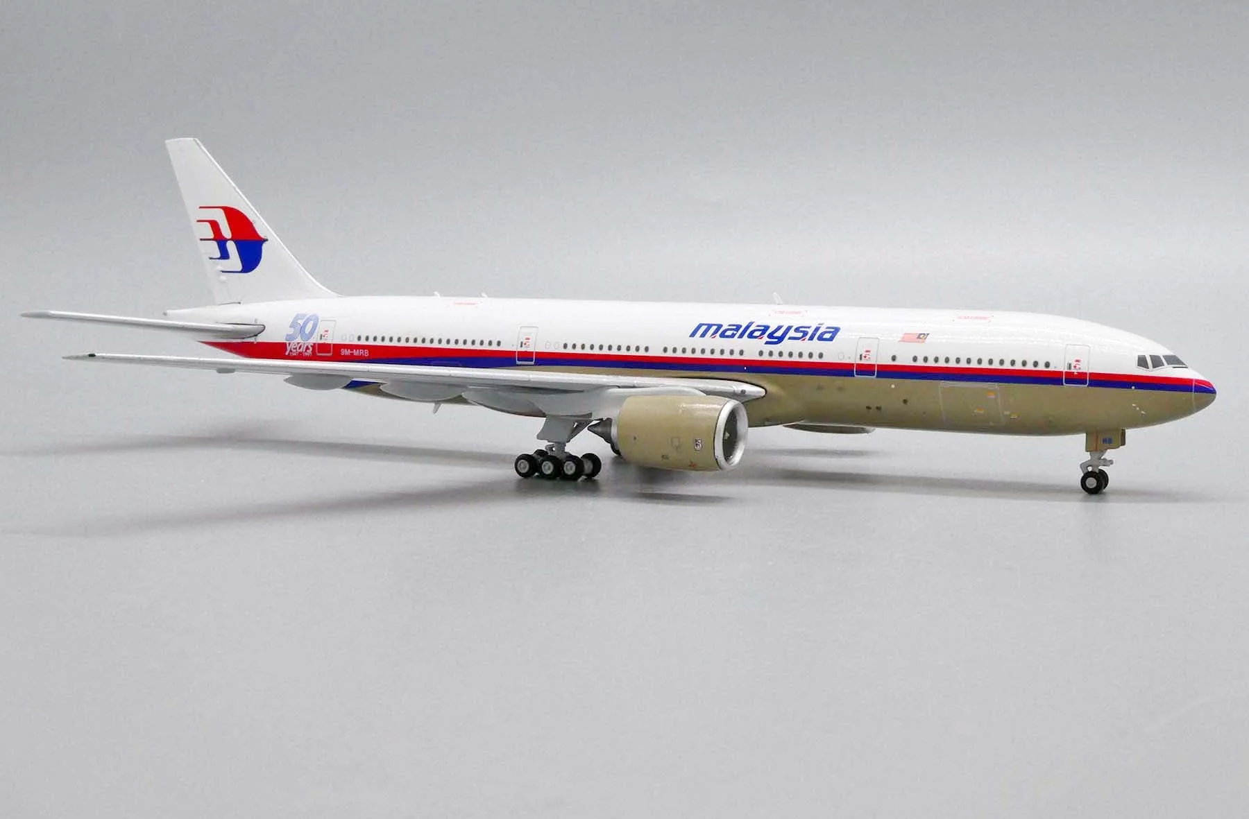 *1/400 Malaysia Airlines B 777-200ER "50 Years 1947-1997" JC Wings JC4MAS488 - Image 10