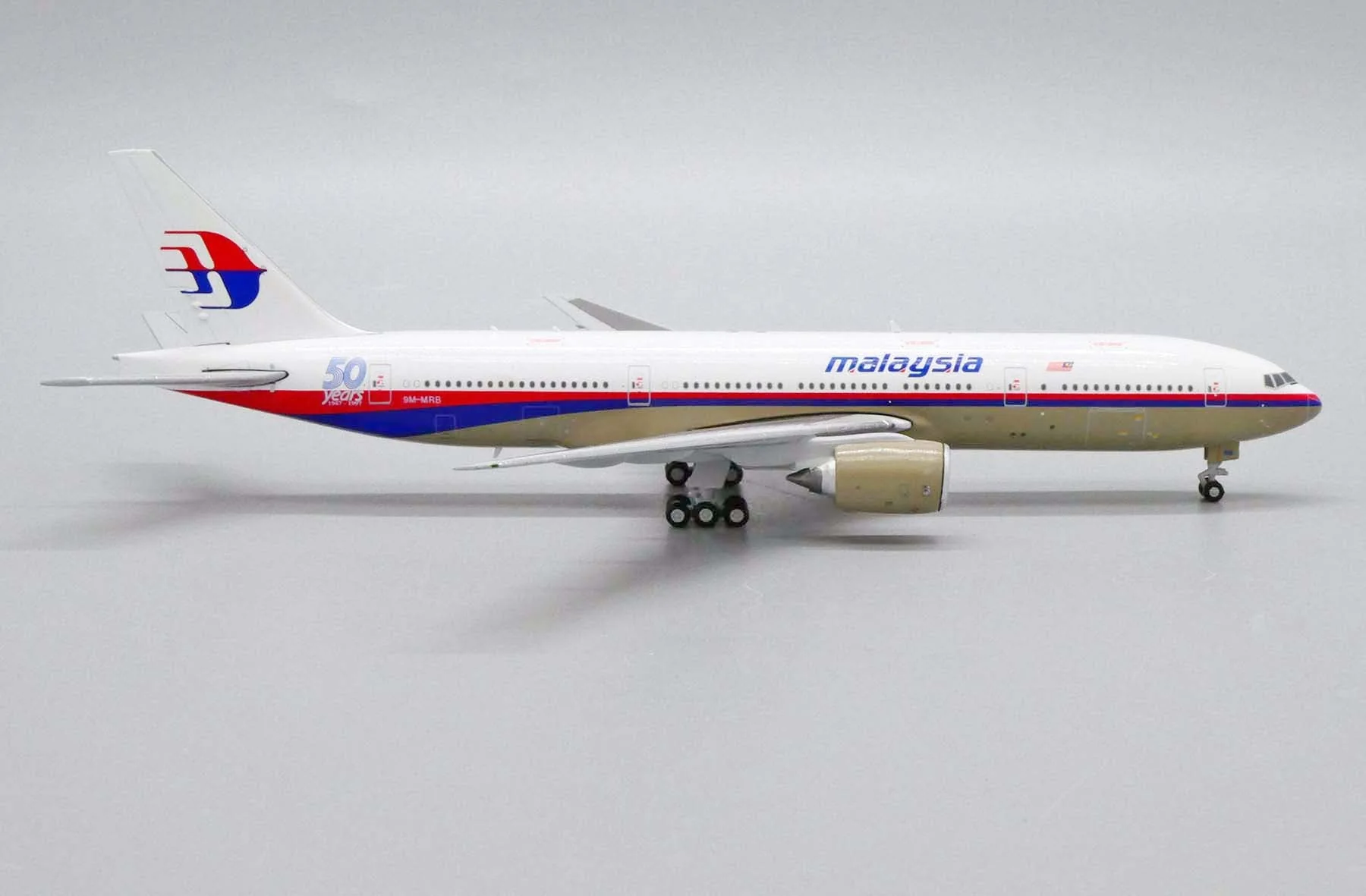 *1/400 Malaysia Airlines B 777-200ER "50 Years 1947-1997" JC Wings JC4MAS488 - Image 2
