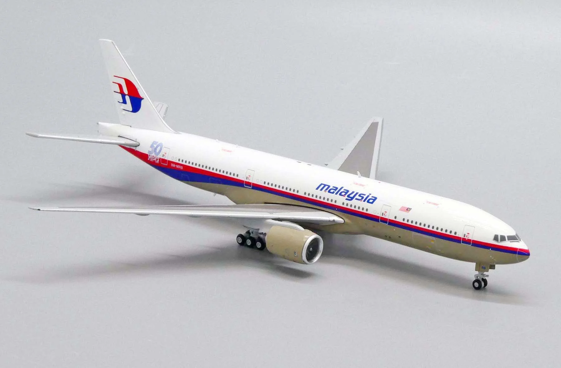 *1/400 Malaysia Airlines B 777-200ER "50 Years 1947-1997" JC Wings JC4MAS488 - Image 3
