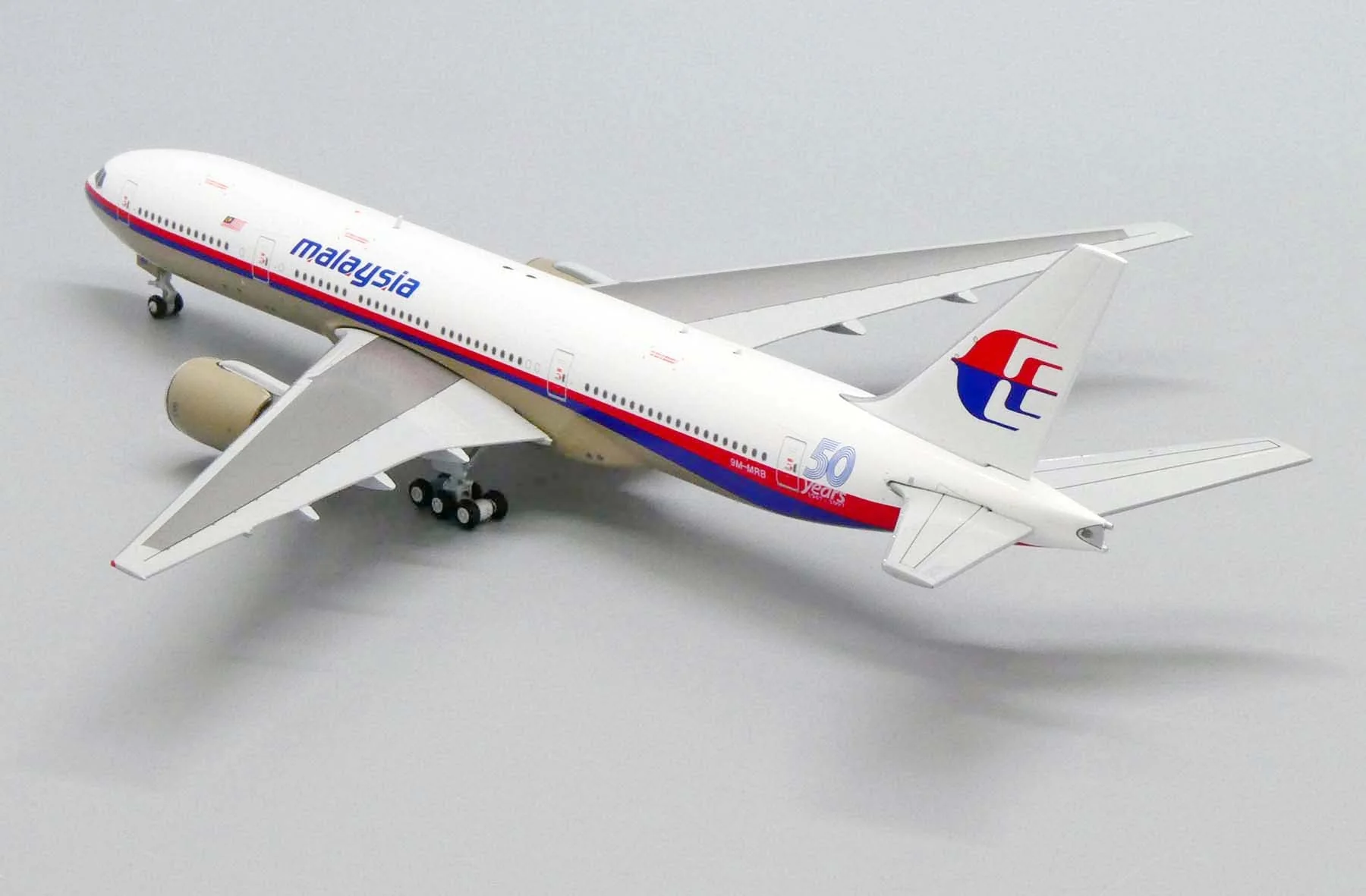*1/400 Malaysia Airlines B 777-200ER "50 Years 1947-1997" JC Wings JC4MAS488 - Image 5