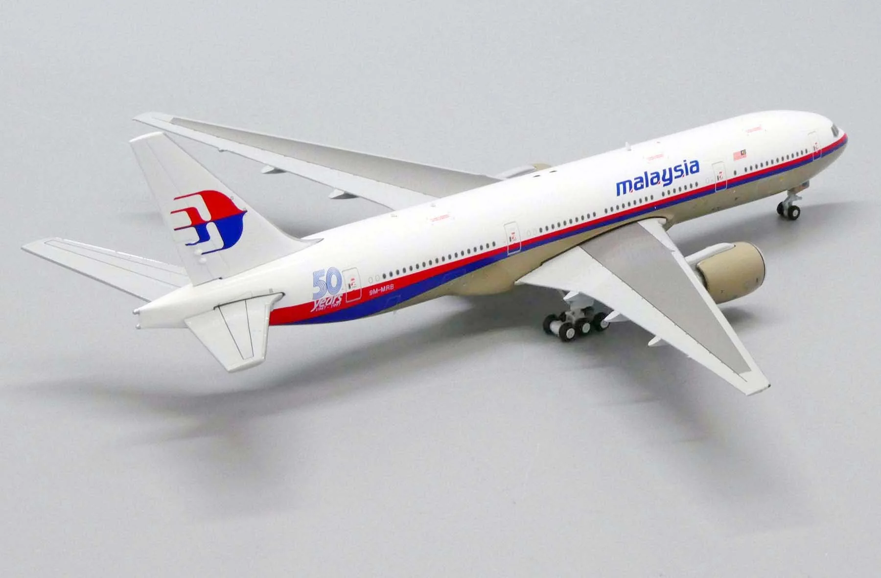 *1/400 Malaysia Airlines B 777-200ER "50 Years 1947-1997" JC Wings JC4MAS488 - Image 6