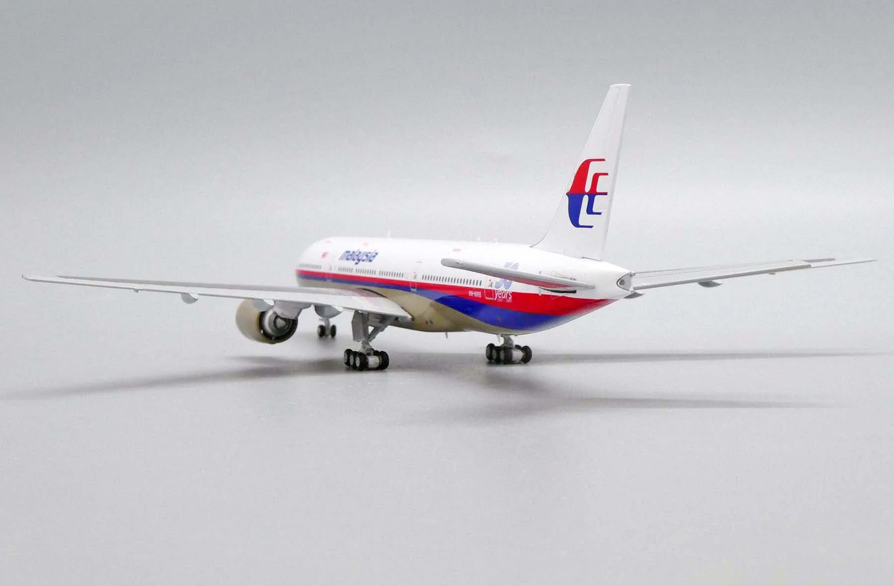*1/400 Malaysia Airlines B 777-200ER "50 Years 1947-1997" JC Wings JC4MAS488 - Image 8