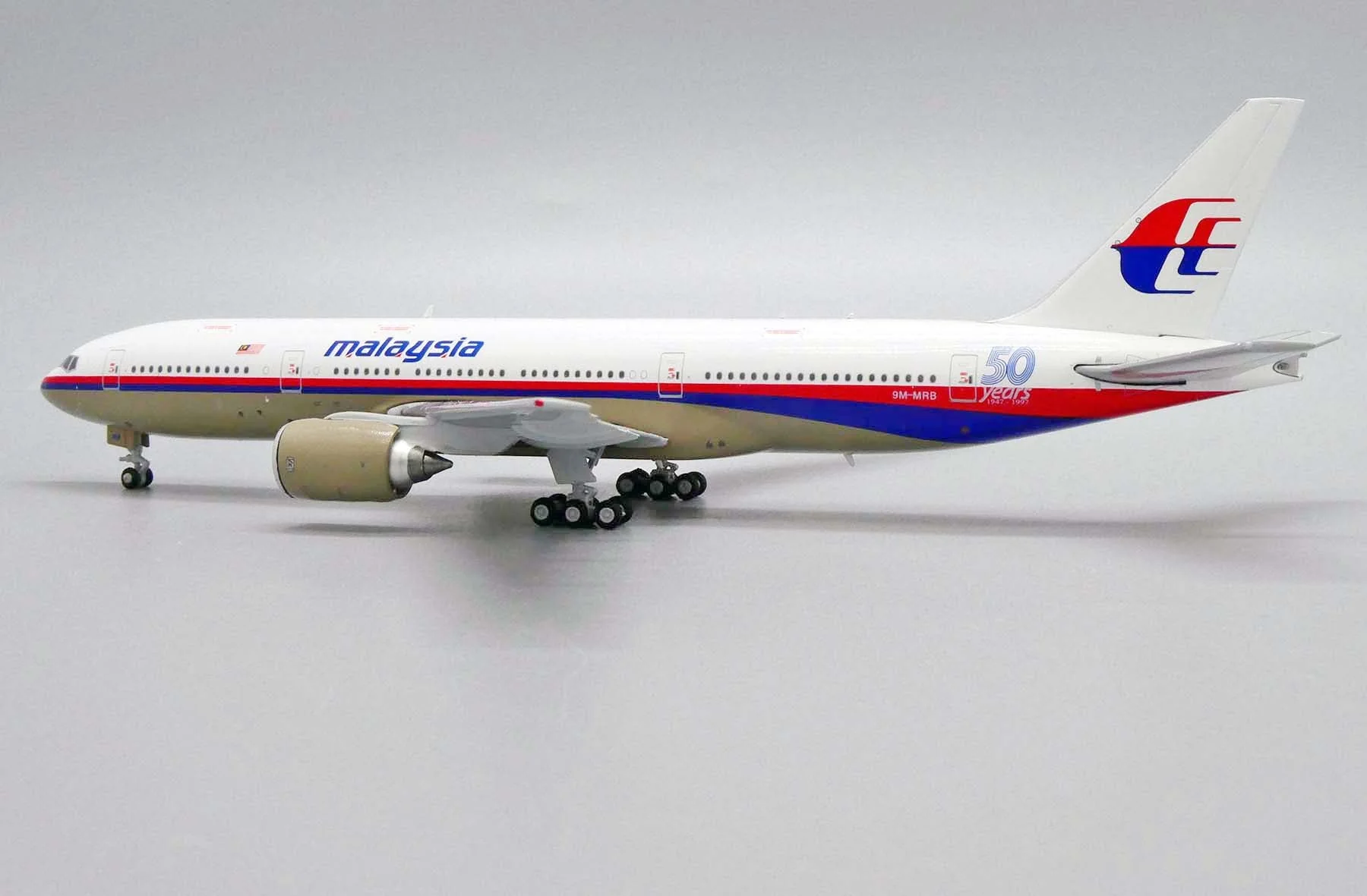 *1/400 Malaysia Airlines B 777-200ER "50 Years 1947-1997" JC Wings JC4MAS488 - Image 9